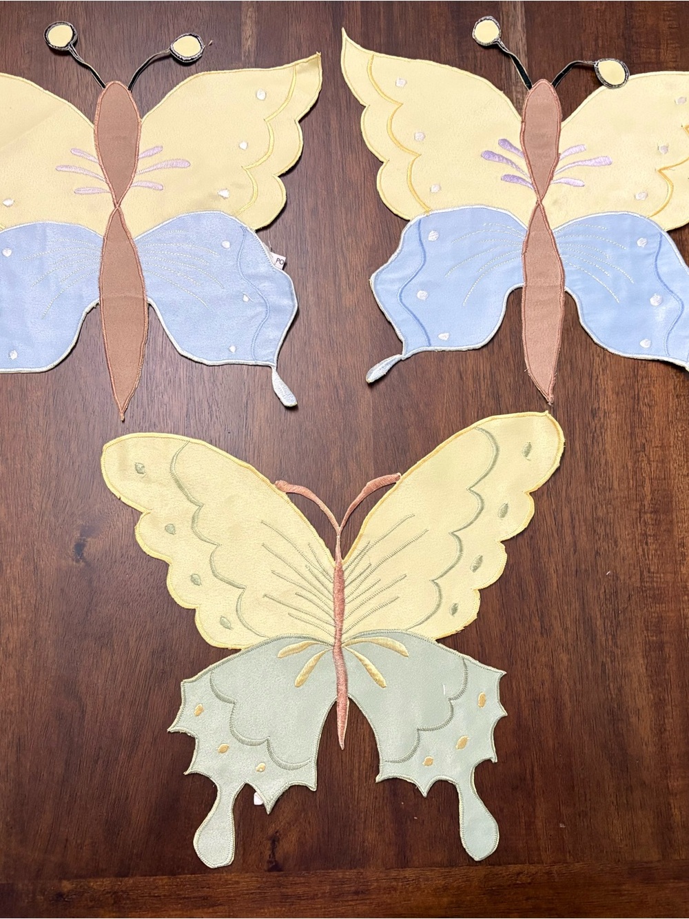 Butterfly Appliqué Wall Hangings in Yellow, Light Blue and Cream